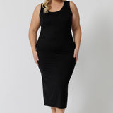 A midi dress that works as a nightdress and as loungewear. Shown on a size 18 woman, this slim-fit, plus size midi-dress in bamboo jersey is breathable and thermo-regulating. A good dress for night sweats and hot flushes, wear this as a summer dress for warm summer days. Shop nightdresses online in sizes 8 to 24 at L&F Australia.