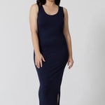 A midi dress that works as a nightdress and as loungewear. Shown for petite women, this slim-fit, plus size midi-dress in navy blue bamboo jersey is breathable and thermo-regulating. A good dress for night sweats and hot flushes, wear this as a summer dress for warm summer days. Shop nightdresses in women's clothes brand, L&F's new loungewear and sleepwear range online in sizes 8 to 24.
