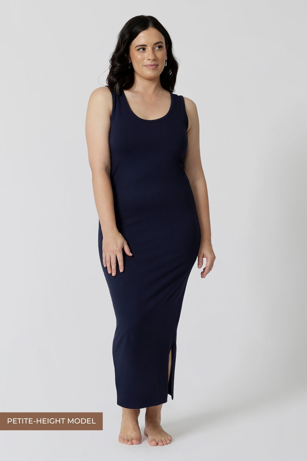 A midi dress that works as a nightdress and as loungewear. Shown for petite women, this slim-fit, plus size midi-dress in navy blue bamboo jersey is breathable and thermo-regulating. A good dress for night sweats and hot flushes, wear this as a summer dress for warm summer days. Shop nightdresses in women's clothes brand, L&F's new loungewear and sleepwear range online in sizes 8 to 24.