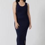 A midi dress that works as a nightdress and as loungewear. Shown for petite women, this slim-fit, plus size midi-dress in navy blue bamboo jersey is breathable and thermo-regulating. A good dress for night sweats and hot flushes, wear this as a summer dress for warm summer days. Shop nightdresses in women's clothes brand, L&F's new loungewear and sleepwear range online in sizes 8 to 24.