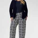 Softly tailored with a refined waterfall collar and an open front design, Mikey offers a polished, jacket-like silhouette that effortlessly carries you from the workday into evening events.
