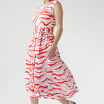 Crafted from breathable natural fibres, the Misha Dress in Pink Tang with Belt blends texture and movement for effortless summer style.