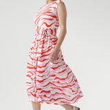 Crafted from breathable natural fibres, the Misha Dress in Pink Tang with Belt blends texture and movement for effortless summer style.