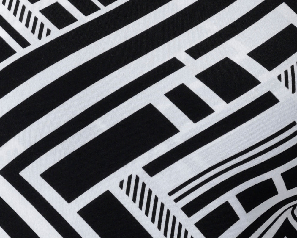 The Moderno print showcases a bold black and white geometric design, brought to life across a curated collection of women’s dresses, tops, and jumpsuits. Perfect for spring racing events, elevated workwear, or effortlessly stylish everyday dressing, each piece is crafted from a premium dry-touch jersey with soft stretch for all-day comfort. Proudly made in Australia by women, for women, the Moderno collection is available in inclusive sizing from 8 to 24.