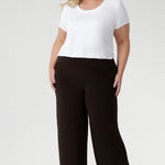 The Monroe Pant offers the perfect blend of style and ease. Cut from our premium heavy-weight dry-touch jersey, it drapes elegantly while maintaining exceptional comfort. With a pull-on waistband, side pockets, deep hem, and classic straight-leg fit, this pant transitions effortlessly from workday polish to weekend style. Available in three lengths, sizes 8–24, proudly Australian made.