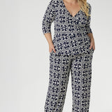 A timeless straight-leg pant designed to move effortlessly from the office to the weekend. Shown here, our size 18 model wears the Kyle Top in Ink Olympia paired with the matching Monroe Pant in Ink Olympia, styled together for a chic, printed jumpsuit effect. Available in sizes 8 to 24, with a choice of three leg lengths for the perfect fit.