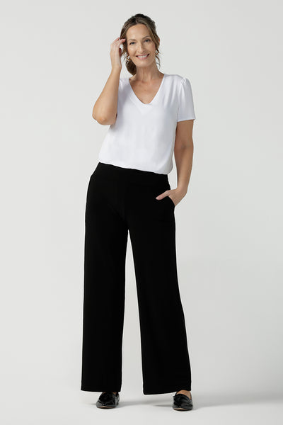Womens size inclusive work pants. Pictured on a size 8 in black comfortable corporate pants. Full length straight leg pants