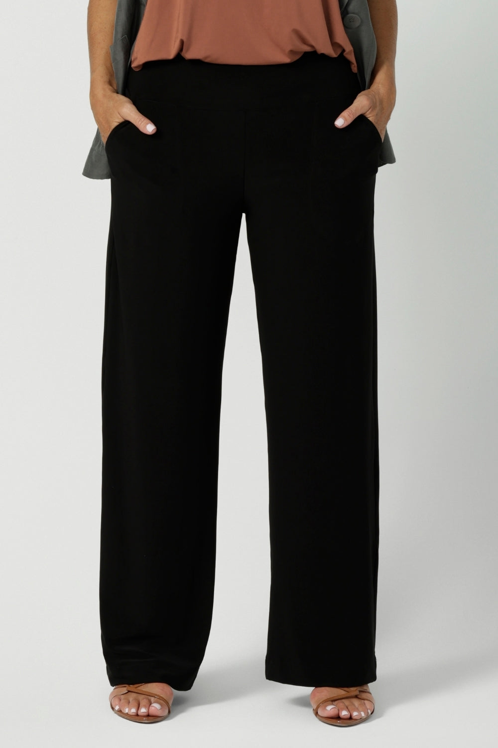 Close up image of the perfect back to work pant. Monroe features a pull on easy style, with full lengths straight legs. Crafted from heavy weight, dry touch jersey fabric in Australia for the woman on the go. Shop online at Australian women's fashion brand Leina & Fleur in a variety of sizes from 8-24. The Monroe Pant now is available in 3 heights variations. 