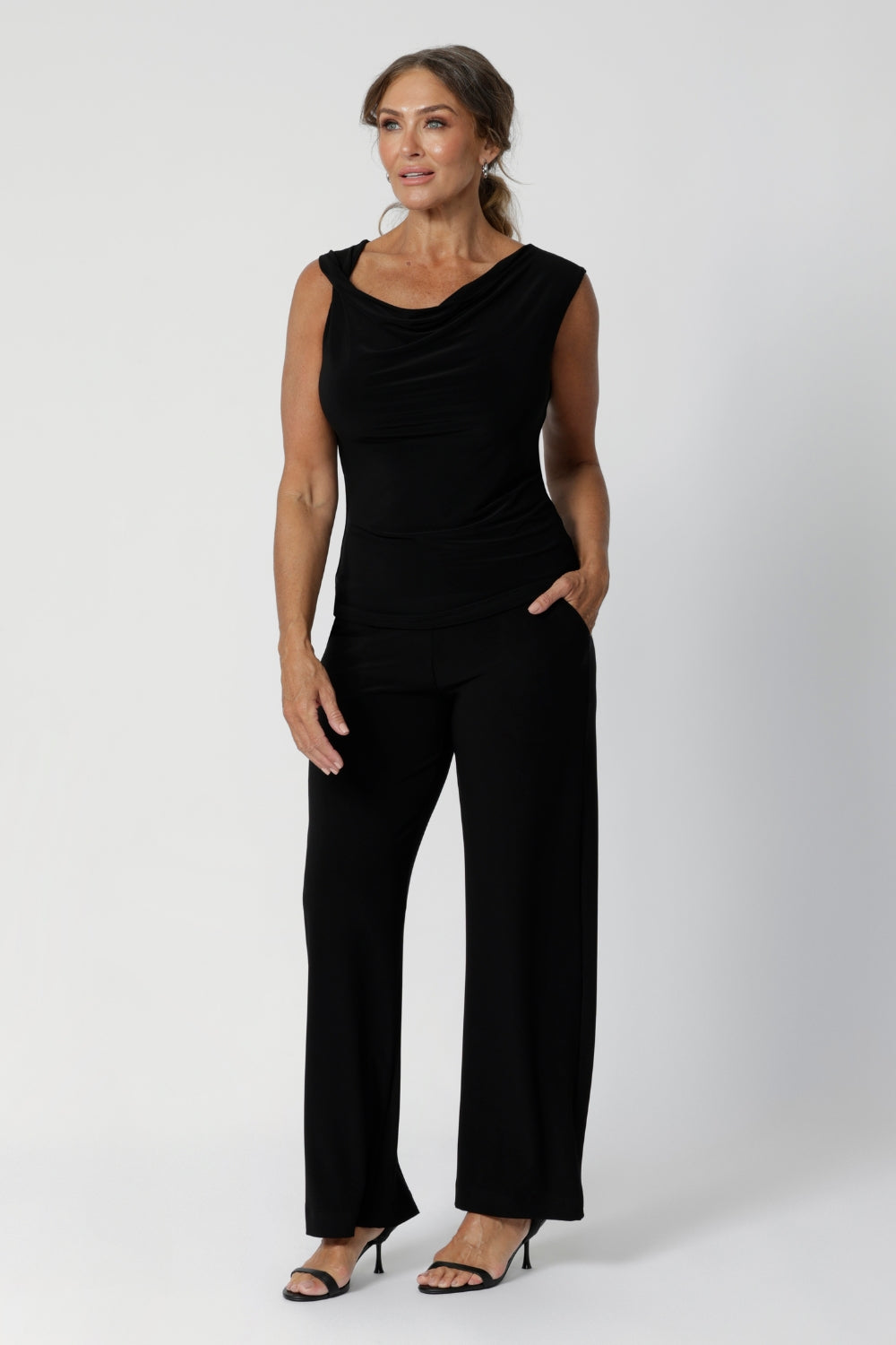 Black workwear pants have a pull on style and a wide straight leg. Crafted with dry touch jersey fabric in Australia for the woman on the go. Shop online at Australian women's fashion brand Leina & Fleur in a variety of sizes from 8-24. Monroe Pant now available in 3 heights.