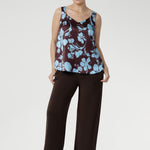 Our signature Monroe Pant is loved for its luxe drape and easy wear. Made from heavy-weight dry-touch stretch jersey, it features a pull-on waist, deep double waistband, side pockets, and a straight-leg silhouette with a deep hem. Designed for comfort and versatility, it’s available in three lengths, sizes 8–24, and pairs effortlessly with our fluid suiting pieces.