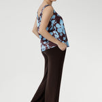 Our signature Monroe Pant is loved for its luxe drape and easy wear. Made from heavy-weight dry-touch stretch jersey, it features a pull-on waist, deep double waistband, side pockets, and a straight-leg silhouette with a deep hem. Designed for comfort and versatility, it’s available in three lengths, sizes 8–24, and pairs effortlessly with our fluid suiting pieces.