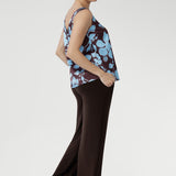 Our signature Monroe Pant is loved for its luxe drape and easy wear. Made from heavy-weight dry-touch stretch jersey, it features a pull-on waist, deep double waistband, side pockets, and a straight-leg silhouette with a deep hem. Designed for comfort and versatility, it’s available in three lengths, sizes 8–24, and pairs effortlessly with our fluid suiting pieces.