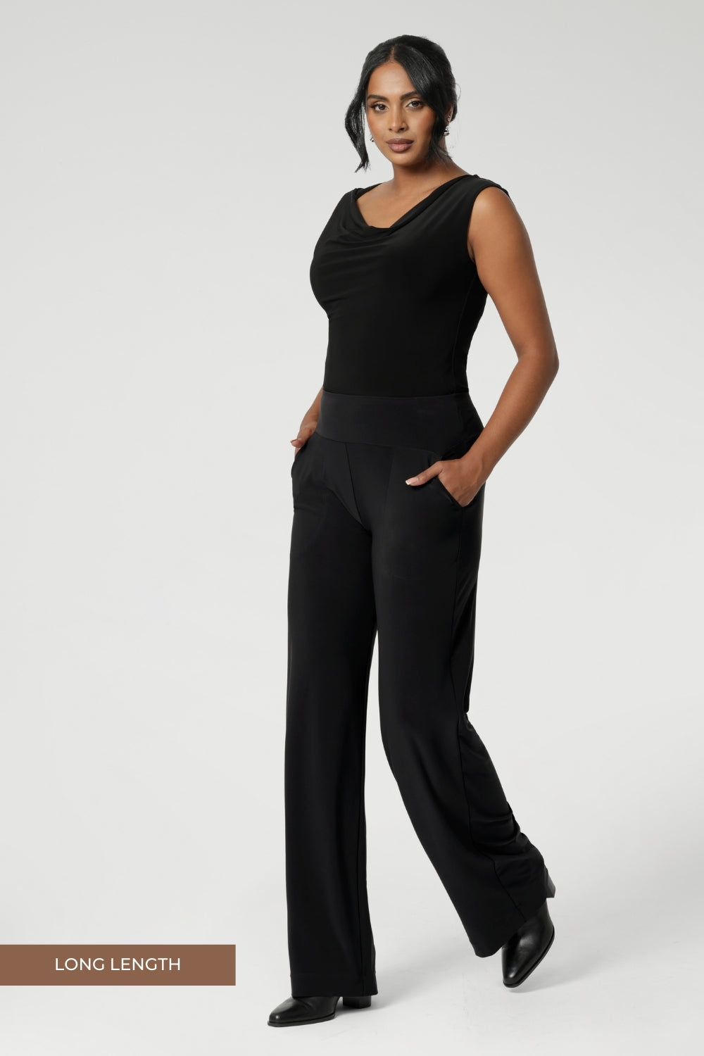 Australian made pull-on pants are available in three lengths, providing the perfect fit for various body types. The deep, double-layer waistband offers a smooth and flattering silhouette, while the side pockets with topstitching detail provide both functionality and a stylish touch. Size 10 model wears hers with black top and black boots. For an easy care easy wear ensemble. 