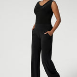 Australian made pull-on pants are available in three lengths, providing the perfect fit for various body types. The deep, double-layer waistband offers a smooth and flattering silhouette, while the side pockets with topstitching detail provide both functionality and a stylish touch. Size 10 model wears hers with black top and black boots. For an easy care easy wear ensemble. 