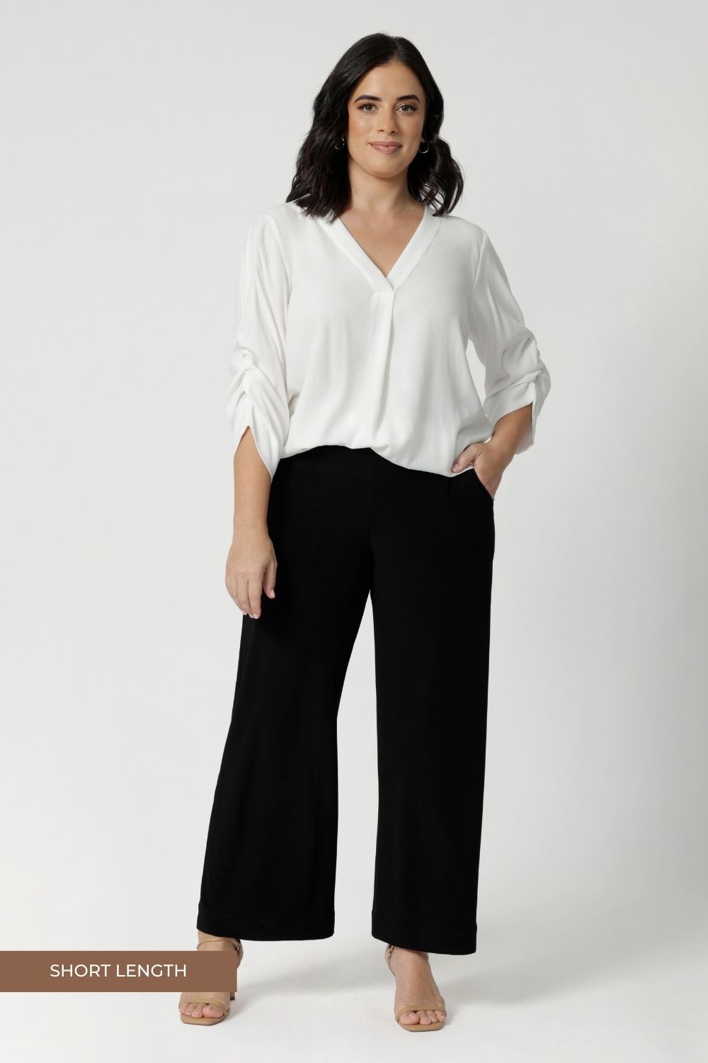 Black workwear pants have a pull on style and a wide straight leg. Crafted with dry touch jersey fabric in Australia for the woman on the go. Shop online at Australian women's fashion brand Leina & Fleur in a variety of sizes from 8-24. Monroe Pant now available in 3 heights.