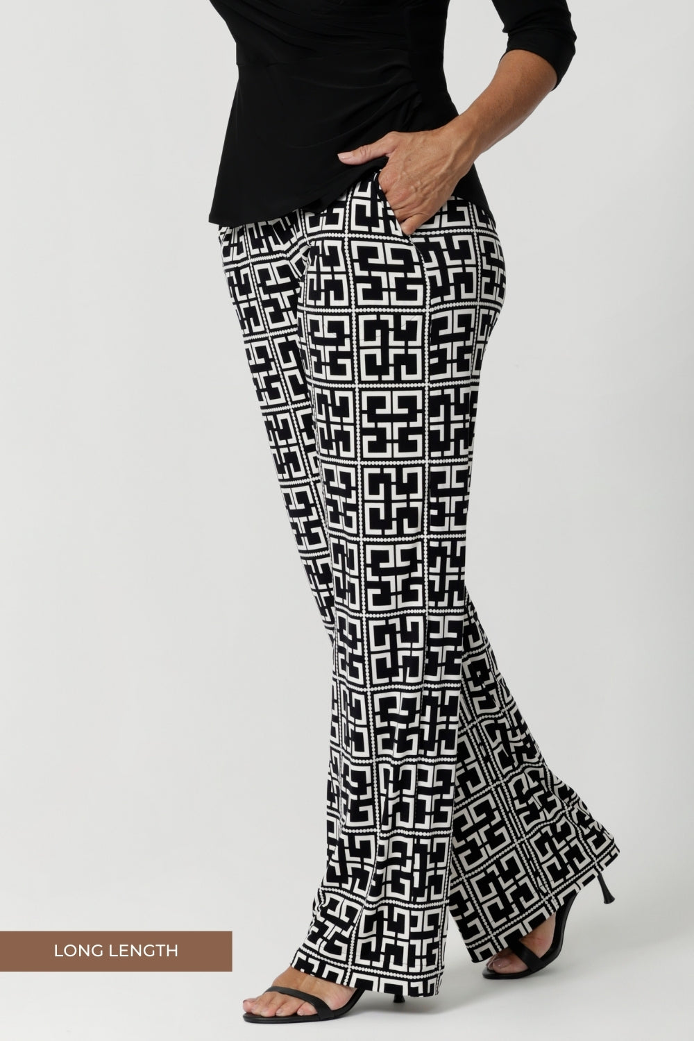 Pull-on pant design features a deep, double-layer waistband. Printed workwear pants offer a smooth, secure fit that flatters the waist without compromising on comfort. The straight leg cut gives a timeless, polished silhouette, while the deep hem adds a refined, tailored finish. Shop online at Leina & Fleur in sizes 8-24.