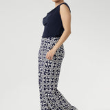 Available in three lengths, the Monroe Pant adapts to your shape and height, making it easy to create a perfectly proportioned look. The dark navy base with crisp white geometric print adds a sophisticated edge, whether you're dressing for the office or styling it casually for weekends. 