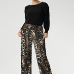 Elevate your everyday style with our best-selling Monroe Pant, now available in the striking Panthera print. Crafted from our signature dry-touch jersey, this luxurious fabric features a soft stretch and rich tones of black, cream, and brown for a bold yet versatile look.