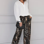 Our best-selling Monroe Pant is crafted from our luxurious printed jersey fabric, offering all-day comfort and a beautifully fluid drape. Style it with a matching top for an easy, coordinated faux jumpsuit look.