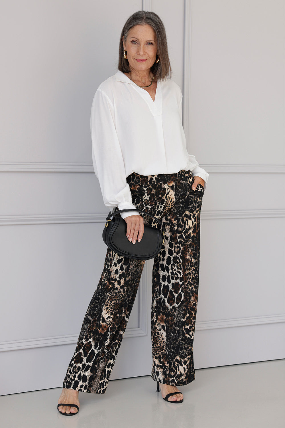 Our best-selling Monroe Pant is crafted from our luxurious printed jersey fabric, offering all-day comfort and a beautifully fluid drape. Style it with a matching top for an easy, coordinated faux jumpsuit look.