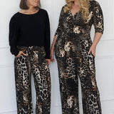 The Monroe Pant offers effortless style and all-day comfort, thanks to its beautifully fluid drape and easy pull-on design. A deep, double-layer waistband provides gentle support, while side pockets with refined topstitching add practical polish. The straight leg cut and deep hem create a clean, elongated silhouette that works for any occasion.