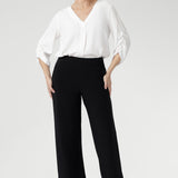 Our best-selling Monroe Pant is crafted from luxurious jersey that drapes beautifully and feels comfortable all day. Designed with a pull-on fit, deep double-layer waistband, side pockets, and straight-leg cut, it’s perfect for pairing with items from our fluid-suiting collection. Australian made and available in sizes 8-24, with three convenient lengths.