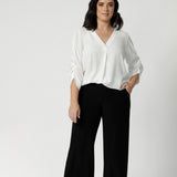 Our Monroe Pant combines timeless style with all-day comfort. Crafted from premium jersey, it boasts a pull-on fit, deep waistband, side pockets with topstitch detail, and a straight-leg cut. Available in three lengths, sizes 8-24, it’s the perfect companion to pieces from our fluid-suiting collection. Designed and made in Australia.