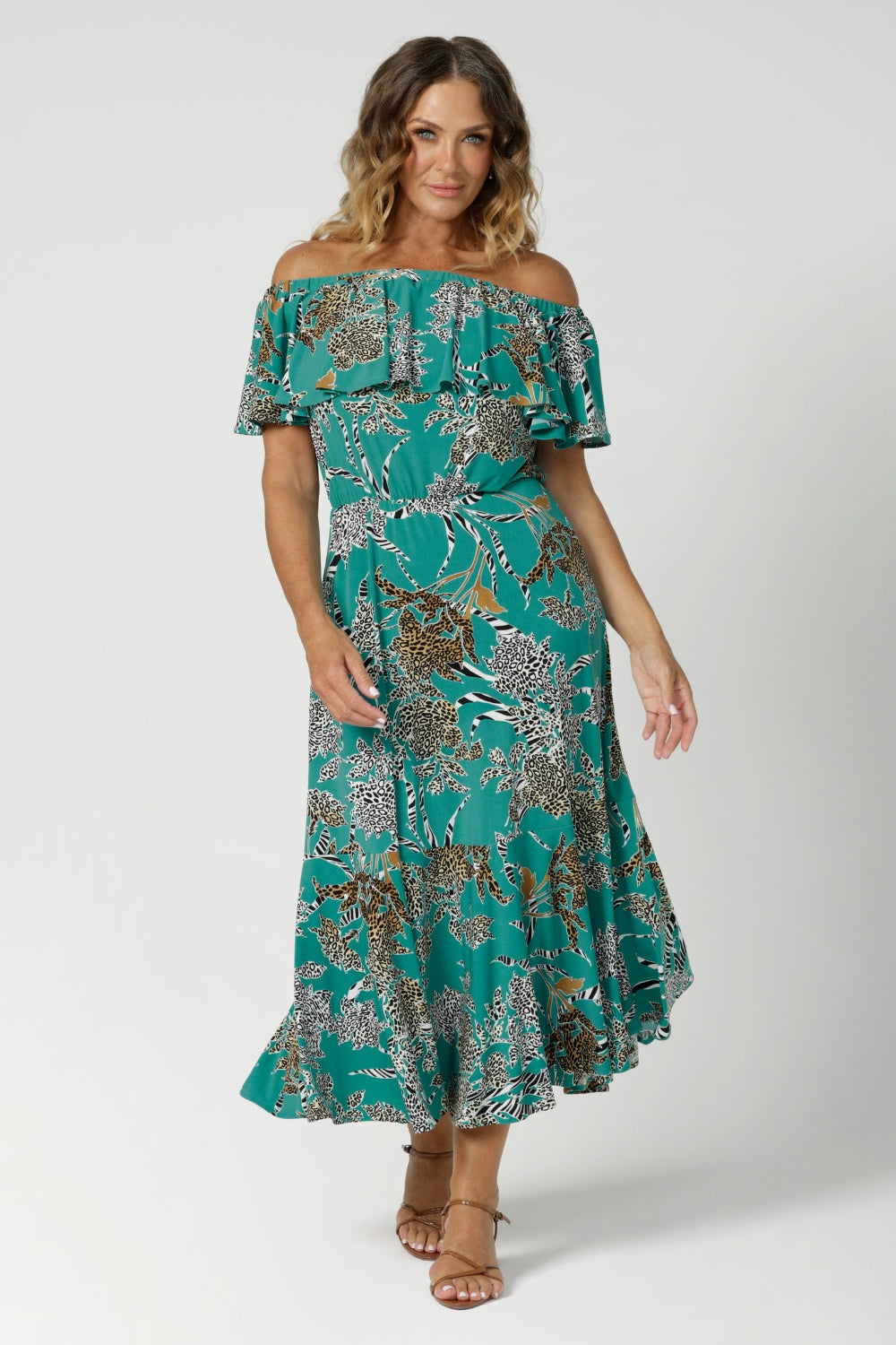 Maxi dress can be worn 3 ways and features side pockets and frill hem. Made in Australia for New Zealand and Australian Women. Shop size inclusive ranges by clothing brand Leina & Fleur in size 8-24.