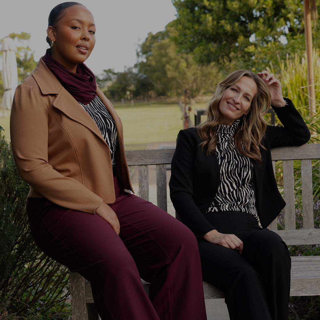 Exploring, Australian and New Zealand women's clothing label, Leina & Fleur's winter capsule wardrobe, two women wear zebra print tops with tailored jackets and workwear pants.