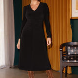 The Nadine Dress is a sophisticated staple, proudly designed and made in Australia from our signature black dry-touch stretch jersey. This timeless piece features a soft A-line silhouette that enhances the figure, while ruched sleeves add a modern, fashion-forward detail. The classic black hue offers endless versatility.