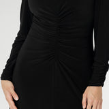 A flattering V-neckline, subtle gathering through the front and back, and shelf lining at the bust create a polished yet comfortable fit. Available in sizes 8–24.