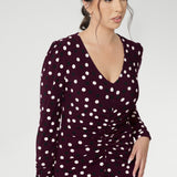 A classic V-neckline and full-length sleeves balance the design, making it perfect for cooler days or layered professional looks. Thoughtfully placed ruched detailing at the front, back, and along the sleeves adds gentle shaping and a touch of textural interest, while enhancing comfort and ease of movement. Available in size 8-24.