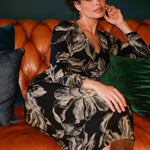 The Nadine Dress is a refined statement piece, expertly crafted in Australia from our signature black dry-touch stretch jersey for a smooth, flattering fit. 