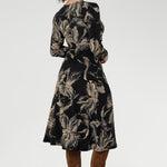 The Nadine Dress is a refined statement piece, expertly crafted in Australia from our signature black dry-touch stretch jersey for a smooth, flattering fit. 