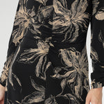 A-line silhouette features fashion-forward ruched sleeves and a deep, inky floral print in a rich coffee hue that captures the essence of the season. Available in sizes 8-24.