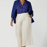 Cobalt Blue V-neck Emily top styled back with Cobalt Linen Blazer and Parchment Nik pants. Made in Australia size 8 to 24.