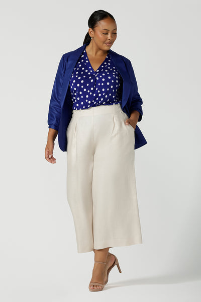 Cobalt Blue V-neck Emily top styled back with Cobalt Linen Blazer and Parchment Nik pants. Made in Australia size 8 to 24.