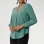 The Paeton Top in Menthol brings a fresh pop of colour to your wardrobe, blending everyday comfort with elevated style. Crafted from premium soft-touch jersey fabric with gentle stretch, this women's top offers a relaxed fit that drapes beautifully on the body. 