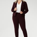 Plus size woman wears Burgundy Paxton Pant. Designed as a pull-on style pant, crafted from dry touch Ponte fabric that provides firm stretch and full body comfort. Size 18 model wears the Garcia Jacket in the matching burgundy colour for a coordinated suiting look.