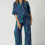 A good coord set for over 40s women, this oversized shirt and wide leg pant set is shown on a size 12 woman. Made from silky rayon-satin, this easy care shirt is made in Australia by Australian and New Zealand women's clothes brand, Leina & Fleur. Shop shirts online in petite to plus sizes