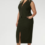 The Pennyworth Vest is crafted to offer endless styling options, thanks to its double-ended zip, allowing for versatile wear. Elevate your style with this chic and functional addition to your closet. Made from a luxurious Scuba Crepe Jersey fabric, it provides a soft, textured feel with comfortable stretch.