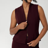 Women's suiting vest features a flattering V-neck and is sleeveless for a modern, sleek look. It’s equipped with a two-way opening zip, offering versatility and ease of movement. Available in sizes 8-24.