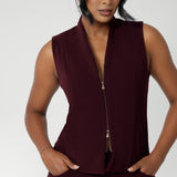 This women's suiting vest in a rich wine colour is made from a luxe Scuba Crepe Jersey fabric that offers a soft, textured feel with full body stretch, ensuring comfort and flexibility throughout the day.