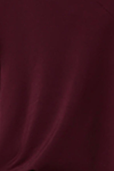 Fabric swatch of plum red slinky jersey fabric used by Australian fashion brand Leina & Fleur to make evening wear cami tops in plus sizes to petite sizes.
