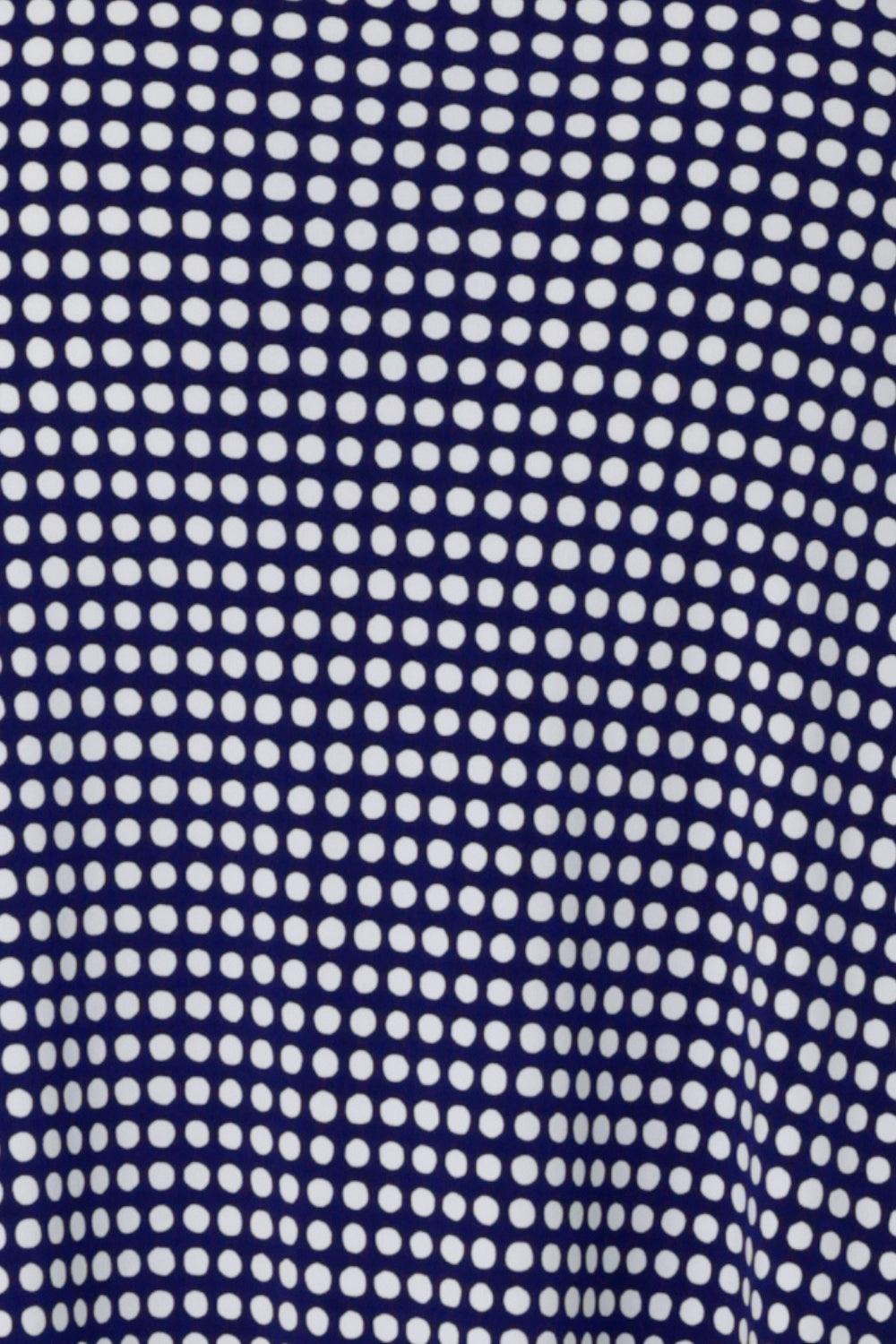 Swatch image of fabric used to create a collection of woman's workwear clothing, crafted in Australia by Leina & Fleur and stocked in sizes 8-24. The Polka Dot print is a white spot print on a navy dry-touch jersey base. The fabric has a soft full body stretch. 