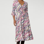 The Portia Dress is a chic and versatile below-the-knee wrap dress that combines style with practicality. Crafted from an Australian-made dry-touch jersey, it has a drier hand feel with a soft stretch for comfort and movement.