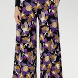 These full-length pants feature an extreme flare leg that brings runway-worthy movement to your everyday or event-ready wardrobe. Available in size 8-24.