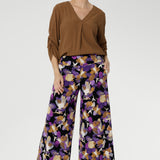 Crafted from our signature dry-touch stretch jersey, these full-length pants feature an extreme flare leg that brings runway-worthy movement to your everyday or event-ready wardrobe. Designed with a pull-on style and a supportive double-layer waistband, the Presley Pant offers a flattering fit with all-day comfort. 