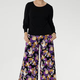 Designed with a pull-on style and a supportive double-layer waistband, the Presley Pant offers a flattering fit with all-day comfort. Side pockets with refined topstitching details add a touch of practicality without sacrificing style.
