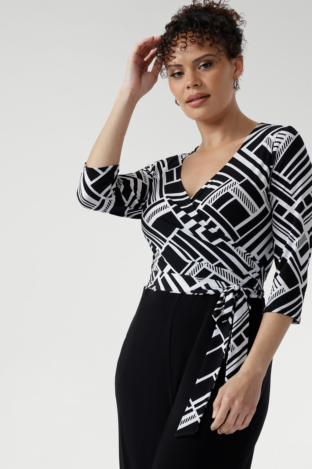 Thoughtfully finished with ¾-length sleeves and a clean neckline, the Puzzle Jumpsuit transitions seamlessly from workwear to evening outings, making it the ultimate wardrobe multitasker.